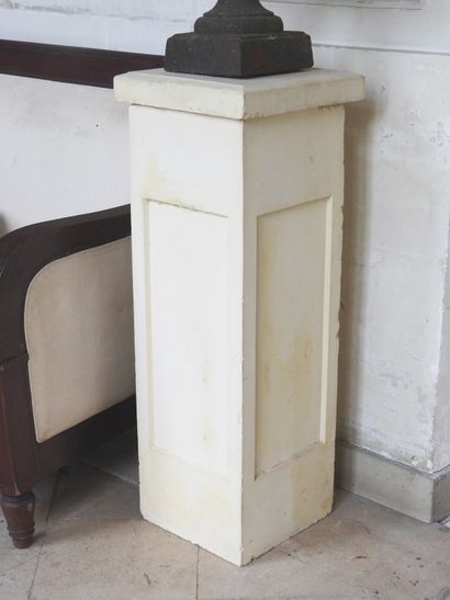 Pair of cast iron Medici vases resting on...