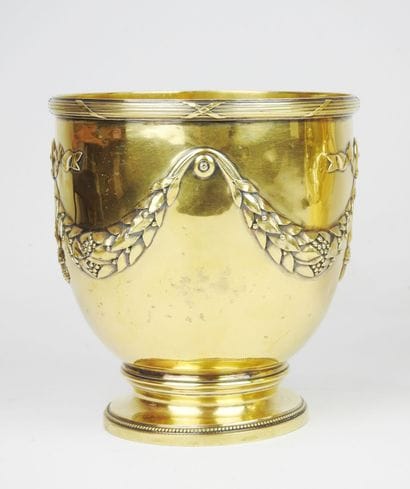 Pair of gilt Minerva silver coolers resting...