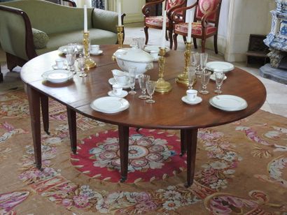 Mahogany dining room table with band, resting...