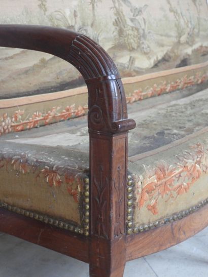 Mahogany sofa, the arms carved with lotus...