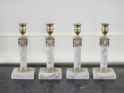 Suite of four candlesticks in the Gustavian...