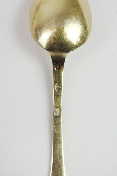 Suite of eight small gilt silver spoons,...