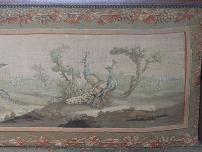 Mahogany sofa, the arms carved with lotus...