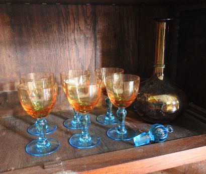 Suite of six glasses and a carafe out of...