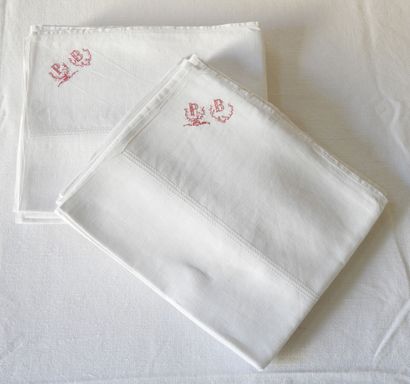 Eleven towels with P.B. in red.