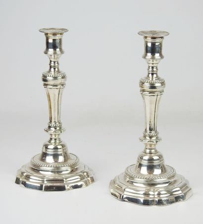 Pair of silver plated bronze candlesticks...