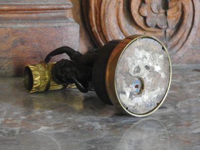 A patinated and gilded bronze match holder...