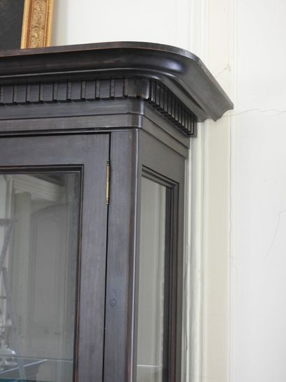 Display case in blackened wood with sides...