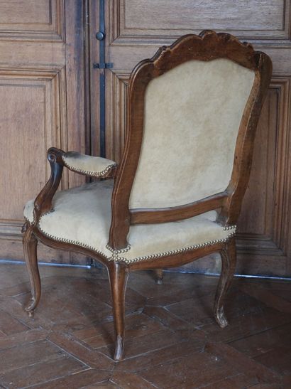 Armchair with flat back in natural wood molded...