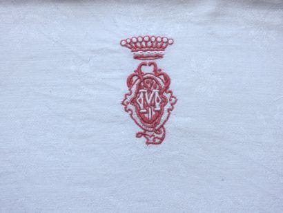 Twelve napkins decorated with flowers and...