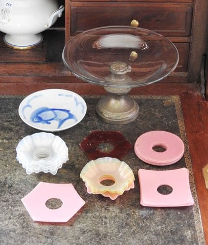 Meeting of a glass cup with metal foot and...