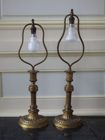 Pair of bronze candlesticks in the Louis...