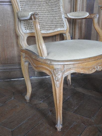 Armchair in molded and carved beech with...