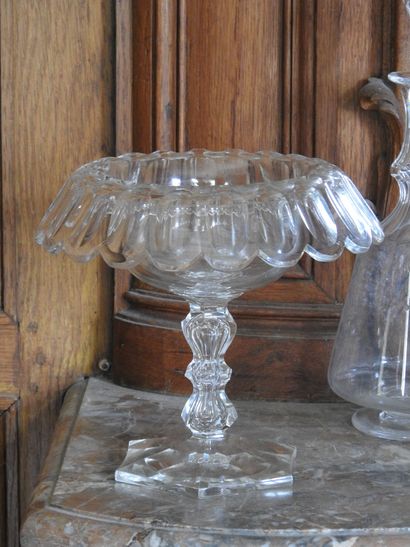 Meeting of two crystal decanters with engraved...
