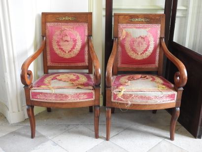 Suite of four mahogany armchairs, the armrests...