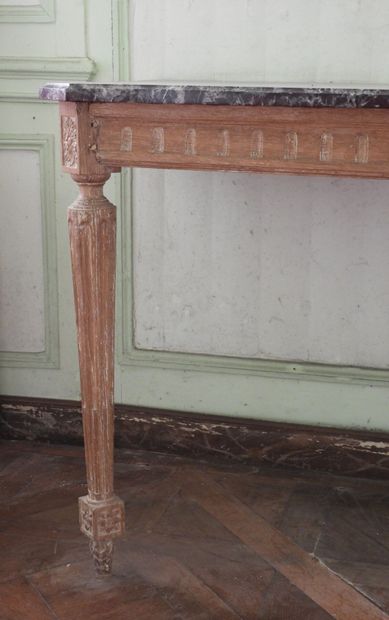 Wall console in carved natural wood resting...
