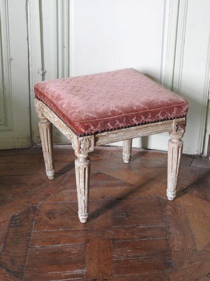 Square shaped stool in molded, carved and...