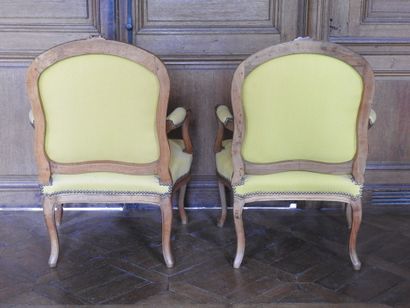 Pair of armchairs in natural wood molded...