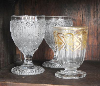 Two pressed crystal glasses. Charles X period....