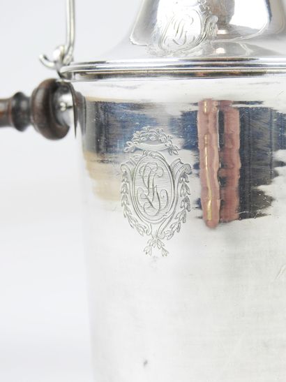 Silver handle milk jug decorated with medallions...
