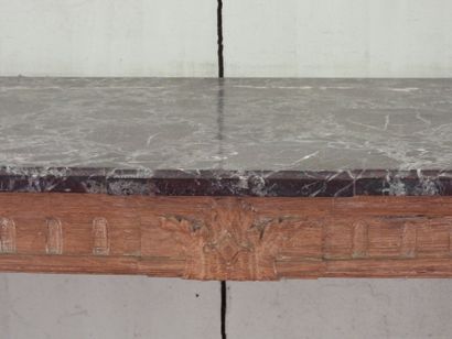 Wall console in carved natural wood resting...