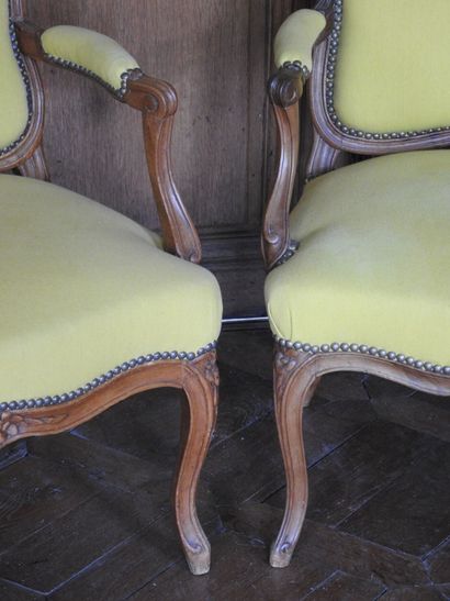 Pair of armchairs in natural wood molded...