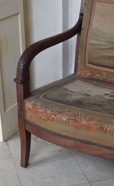 Mahogany sofa, the arms carved with lotus...