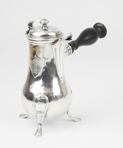 Silver tripod selfish jug decorated with...