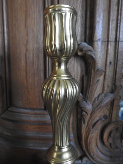 Pair of ormolu torches with torso shaft....