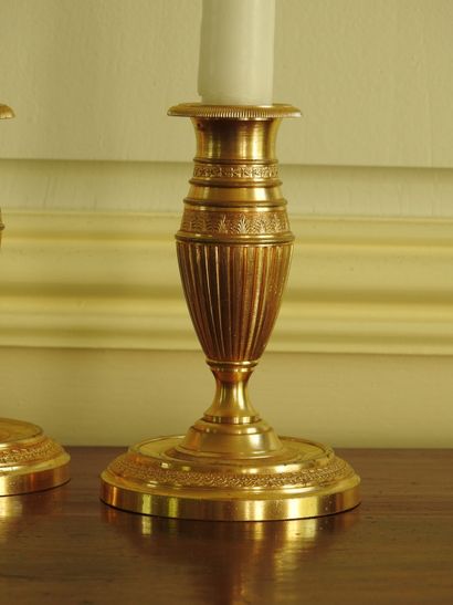 Pair of gilt bronze toilet candlesticks in...