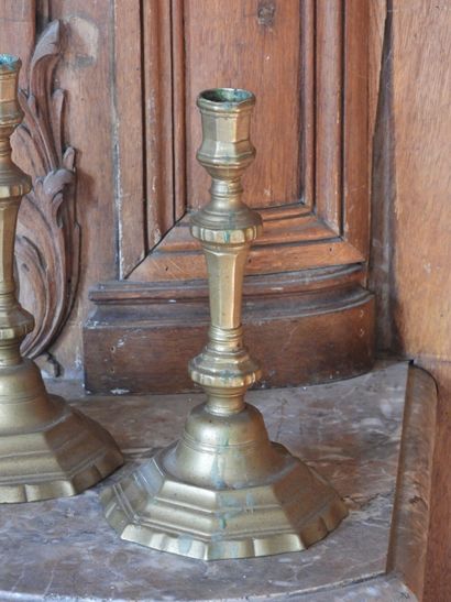 Pair of bronze torches with cut sides. Period...