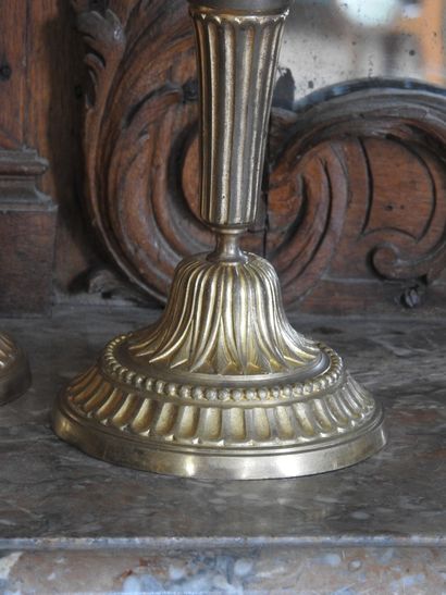Pair of ormolu torches decorated with hearts...