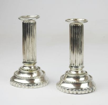 Pair of candlesticks of toilet in silver...