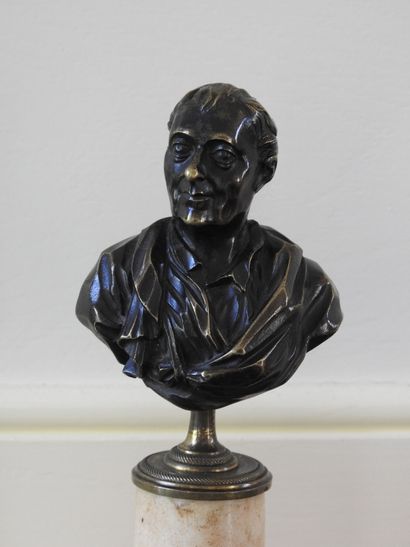 Pair of busts in bronze with brown patina...
