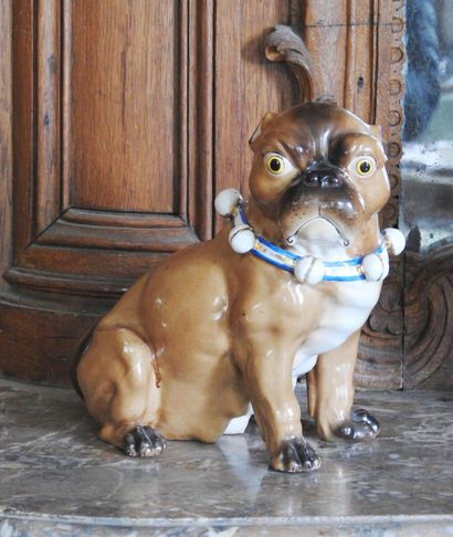 Couple of pugs in polychrome enamelled porcelain....