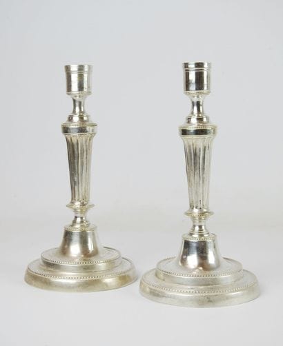 Pair of Louis XVI period candlesticks in...