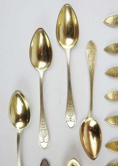 Suite of twelve small silver spoons gilded...