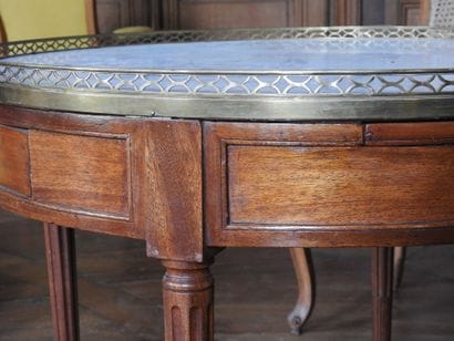 Mahogany bouillotte table opening in the...