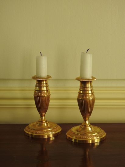 Pair of gilt bronze toilet candlesticks in...