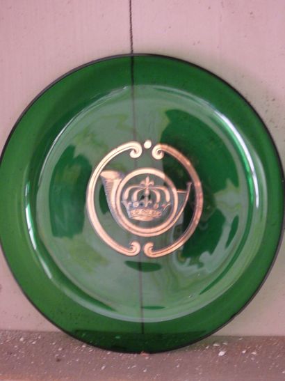 Suite of three green tinted crystal cups...