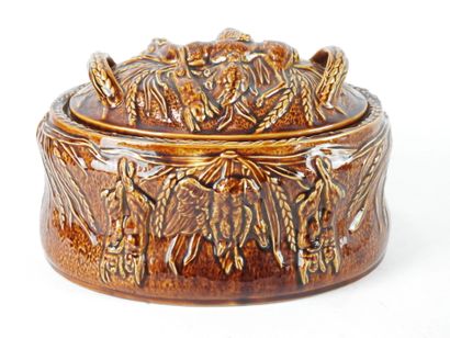 Earthenware TERRACE of oval form with decoration...