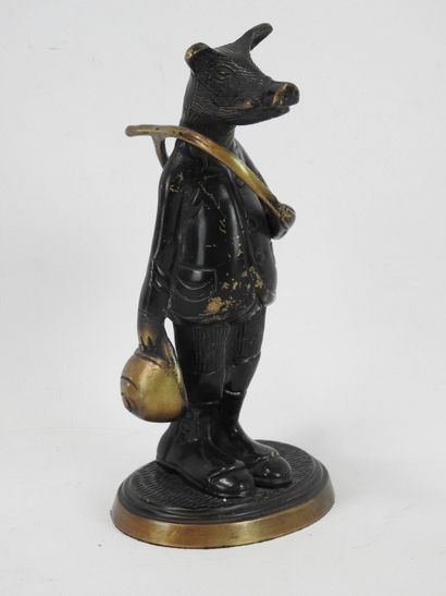 SUBJECT in bronze with brown patina representing...