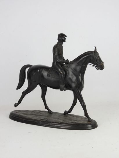 RIDER ON HORSEBACK. Bronze group with brown...