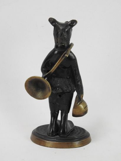 SUBJECT in bronze with brown patina representing...