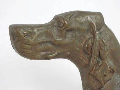 BUST of a dog in bronze, signed RM. 13 x...