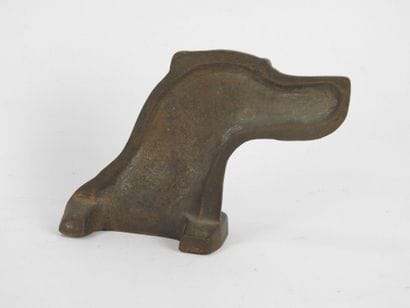 BUST of a dog in bronze, signed RM. 13 x...
