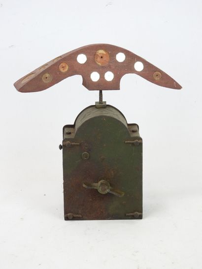 Wood and metal mirror. Mechanical winding...