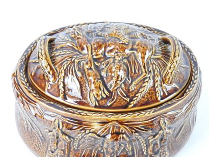 Earthenware TERRACE of oval form with decoration...