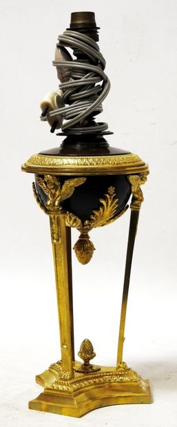 Lamp stand in chased ormolu and black lacquered...