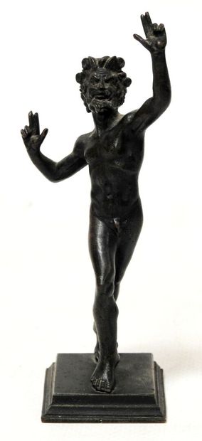 Statuette in bronze with brown patina representing...